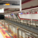Метростанция с работници и релси
